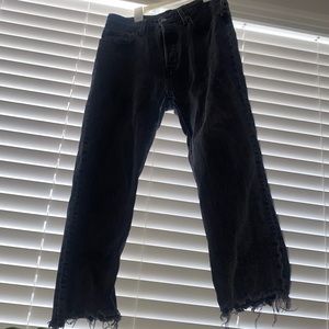 Dark Wash Levi’s cropped jeans with scalloped legs